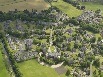 General oblique aerial view of Quarriers Village and Mount Zion Church, taken from the NNW.
