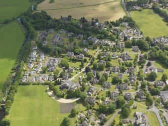 General oblique aerial view of Quarriers Village and Mount Zion Church, taken from the NW.