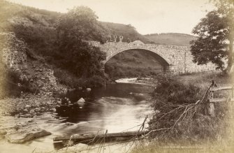 View of bridge with men standing on top in the Fenwick area.

