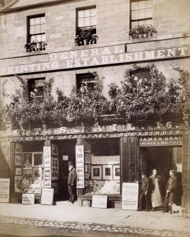 View of Thomas Smail's General Printing Establishment, 16 High Street, Jedburgh, with figures and next door premises of James Gray, Brewer & Maltster.