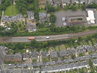 Oblique aerial view centred on the railway station, taken from the N.