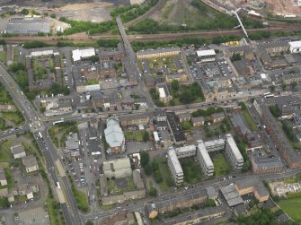 Oblique aerial view centred on Rutherglen Main Street, taken from the SSW.