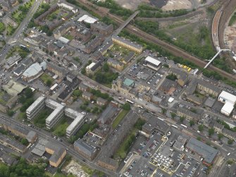 Oblique aerial view centred on Rutherglen High Street, taken from the SE.