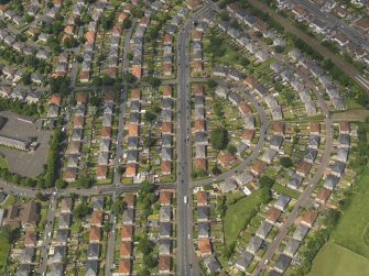 Oblique aerial view centred on the housing estate, taken from the SE.