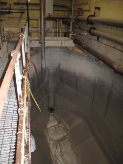 Interior. Building 4. Broke Bleaching Plant, first floor west bleaching chest looking S.