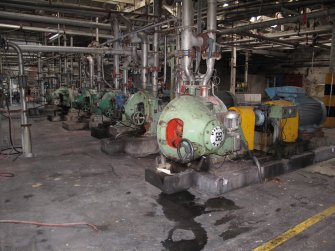 Interior. Building 2. Stock Preparation House, first floor. Refiners looking NW.