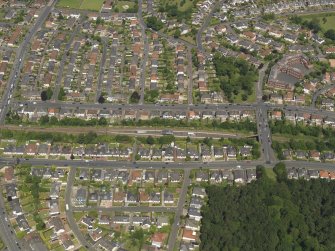 Oblique aerial view centred on the railway station, taken from the S.