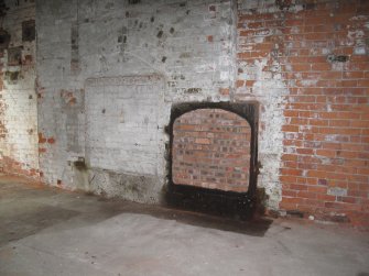 Interior. Building 14. Engine House for original No. 3 Paper Machine. Detail of fireplace on north wall.
