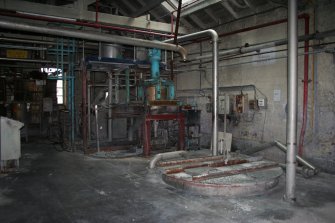 Interior. Building 4, first floor. Broke Revovery area looking towards Stock Preparation plant for Paper Machine No. 3 which was housed in this area since 2003. The Batch chest is on the right, the blend chest and headbox behind, with the hydrasieve just visible. The hydrapulpers are out of shot.