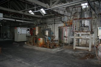Interior. Building 4, Broke Bleaching and Recovery, first floor. View of Starch Cooker adjacent to Broke Recovery and paper Machine No.3 stock preparation