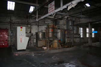 Interior. Building 4, Broke Bleaching and Recovery, first floor. View of Starch Cooker adjacent to the Paper Machine No.3 stock preparation area.