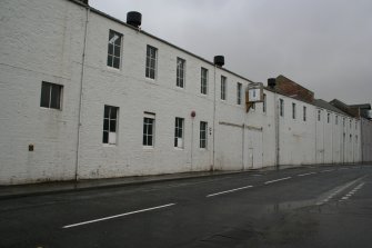 General view., Main Street Frontage. North railway access with clock over; view looking south east.