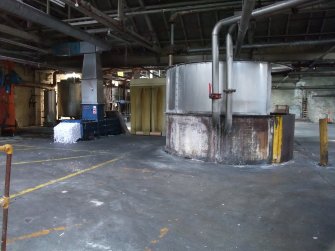 Interior, Building 4, Broke Bleaching and Broke Recovery. View from NE looking towards 12 feet width hydrapulper with baler (in blue) behind.