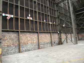 Interior. Building 1,  Wood Pulp Storage Shed (South). View of brick and corrugated iron construction.