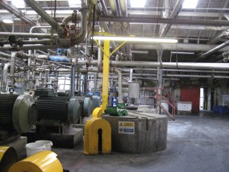 Interior. Building 2, Stock Preparation House, first floor. Refiner floor and Blend Chest to right of image.