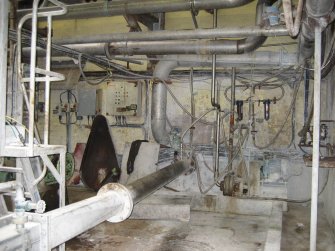 Interior. Building 3, No.4 Paper Machine area, ground floor. Pipe from pressure screen to flow box (out of picture on left).