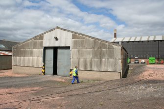 General view,. Building 21, Reel paper store. looking north, Wood Pulp Storeage Sheds (Building 1) on right.