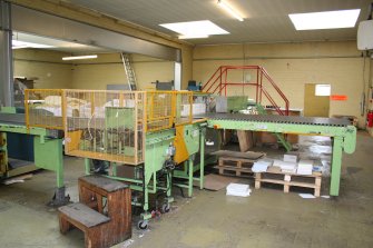 Interior. Adjacent to Building 7, Finishing Section.. View of sheet cutting and handling area.