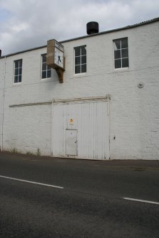 Detail of Main Road frontage in Guardbridge looking east. Note sliding wooden door for former railway access.
