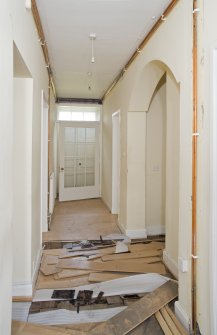 Interior. Basement. Passage with archway. View from SW