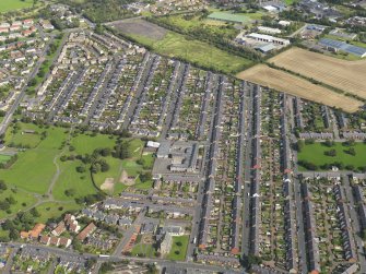 Oblique aerial view centred on the village, taken from the WSW.