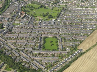 Oblique aerial view centred on the village, taken from the SSE.