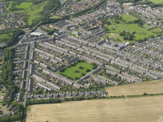 Oblique aerial view centred on the village, taken from the SE.