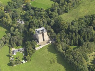 Oblique aerial view centred on the castle, taken from the W.