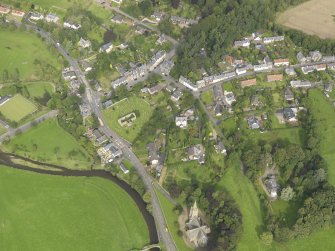 General oblique aerial view centred on the village, taken from the SSW.