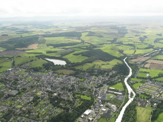General oblique aerial view centred on the town, taken from the NE.