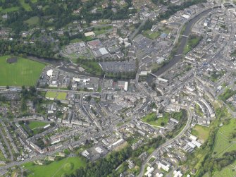 General oblique aerial view centred on the town , taken from the SW.