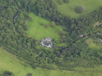 Oblique aerial view centred on the country house (castle), taken from the W.