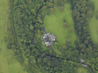 Oblique aerial view centred on the country house (castle), taken from the S.