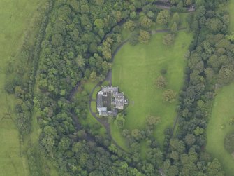 Oblique aerial view centred on the country house (castle), taken from the SSE.