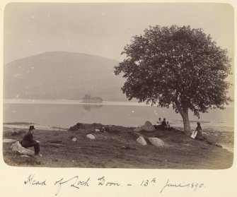 View of family group at lochside with castle in the background.
Titled: 'Head of Loch Doon. 13th June 1890'.
