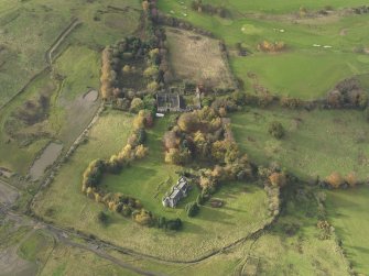 Oblique aerial view centred on the country house, taken from the E.