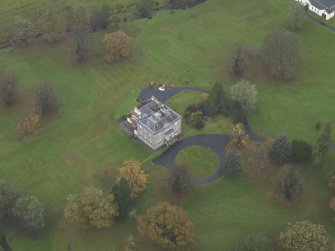 Oblique aerial view centred on the country house, taken from the SE.