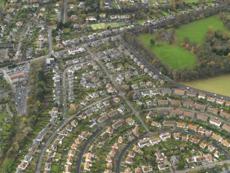 Oblique aerial view centred on part of the Silverknowes Housing Estate, taken from the E.