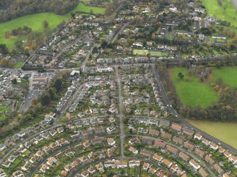 Oblique aerial view centred on part of the Silverknowes Housing Estate, taken from the NE.