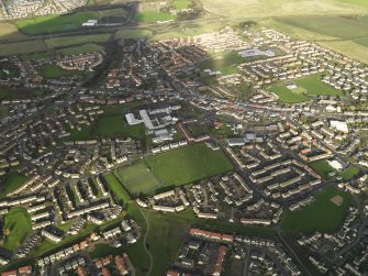 General oblique aerial view centred on town, taken from the SSE.