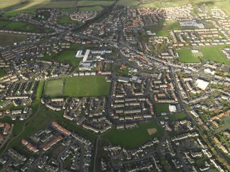 General oblique aerial view centred on town, taken from the SE.