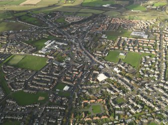 General oblique aerial view centred on town, taken from the SE.