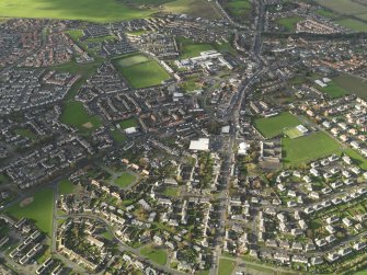 General oblique aerial view centred on town, taken from the ESE.