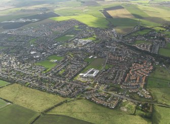 General oblique aerial view centred on town, taken from the NE.