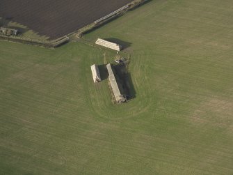 Oblique aerial view centred on the gymnasium, taken from the SE.