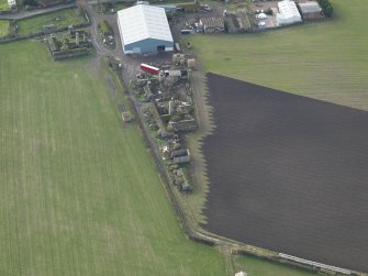 Oblique aerial view centred on the domestic site, taken from the NE.