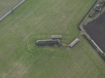 Oblique aerial view centred on the gymnasium, taken from the NE.