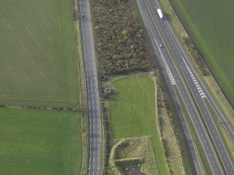 General oblique aerial view centred on the pillbox,  taken from the E.