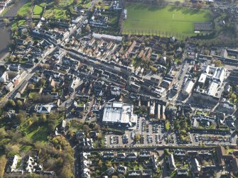 General oblique aerial view centred on the central area of the town, taken from the NNW.