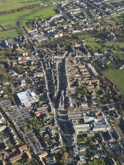 General oblique aerial view centred on the central area of the town, taken from the W.